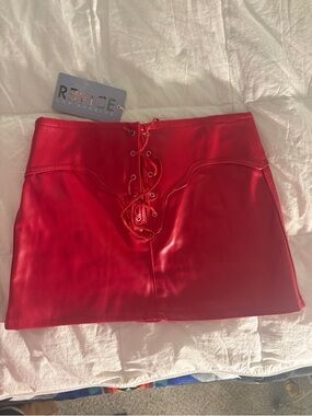 REVICE Red Faux Leather Lace-Up Mini Skirt